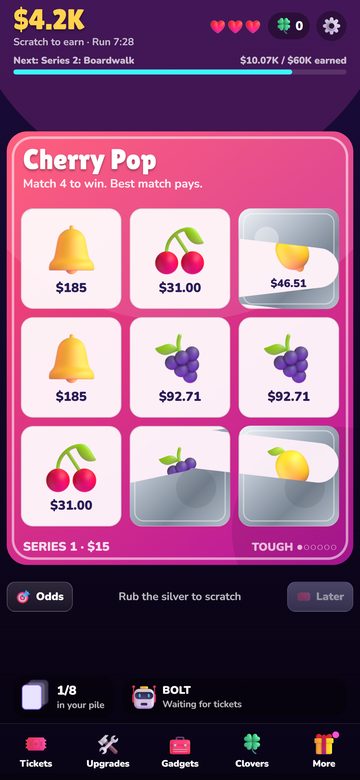 The Scratchpot game on a phone, a scratch card of bells, cherries and grapes partly scratched off